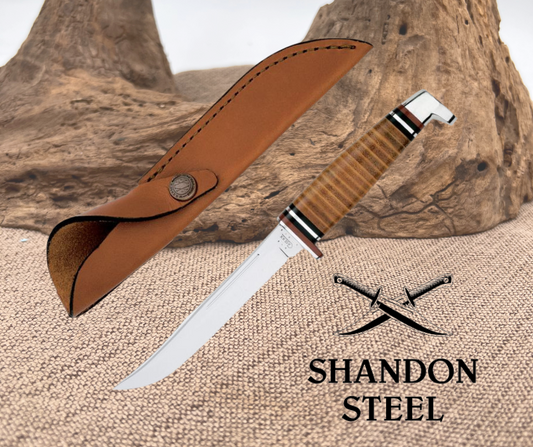 A Case XX Hunter 381 knife with a stainless steel blade and brown leather handle, accompanied by a brown leather sheath. The knife is displayed against a wooden background.