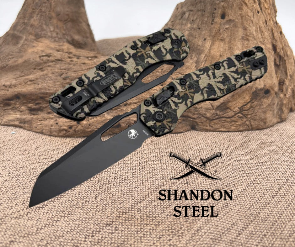 Camouflage-patterned knife with black blade on a wooden surface, featuring Shandon Steel branding.