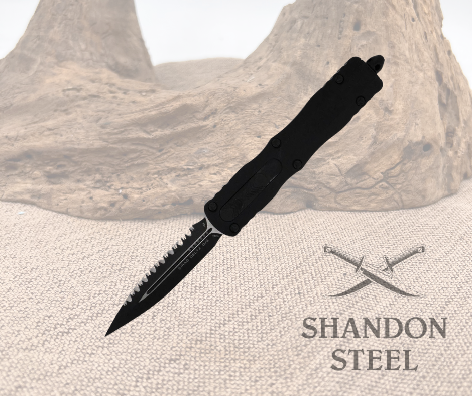 A black Microtech Dirac Delta D/E 227-3 TA knife with a serrated edge, placed on a textured surface with the brand 'Shandon Steel' visible.
