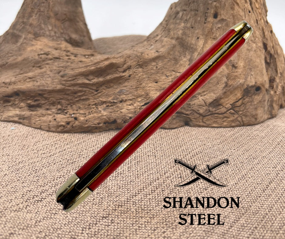 QUEEN STEEL SMOOTH RED COMPOSITION SLIMLINE TRAPPER SINGLE BLADE KNIFE (15)