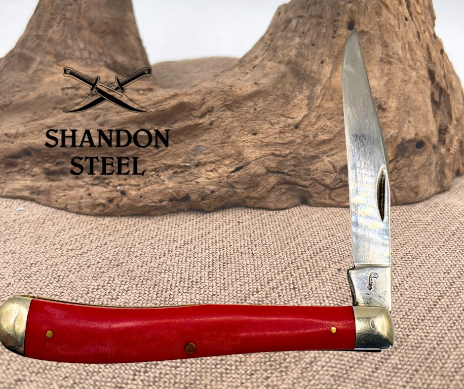 QUEEN STEEL SMOOTH RED COMPOSITION SLIMLINE TRAPPER SINGLE BLADE KNIFE (15)