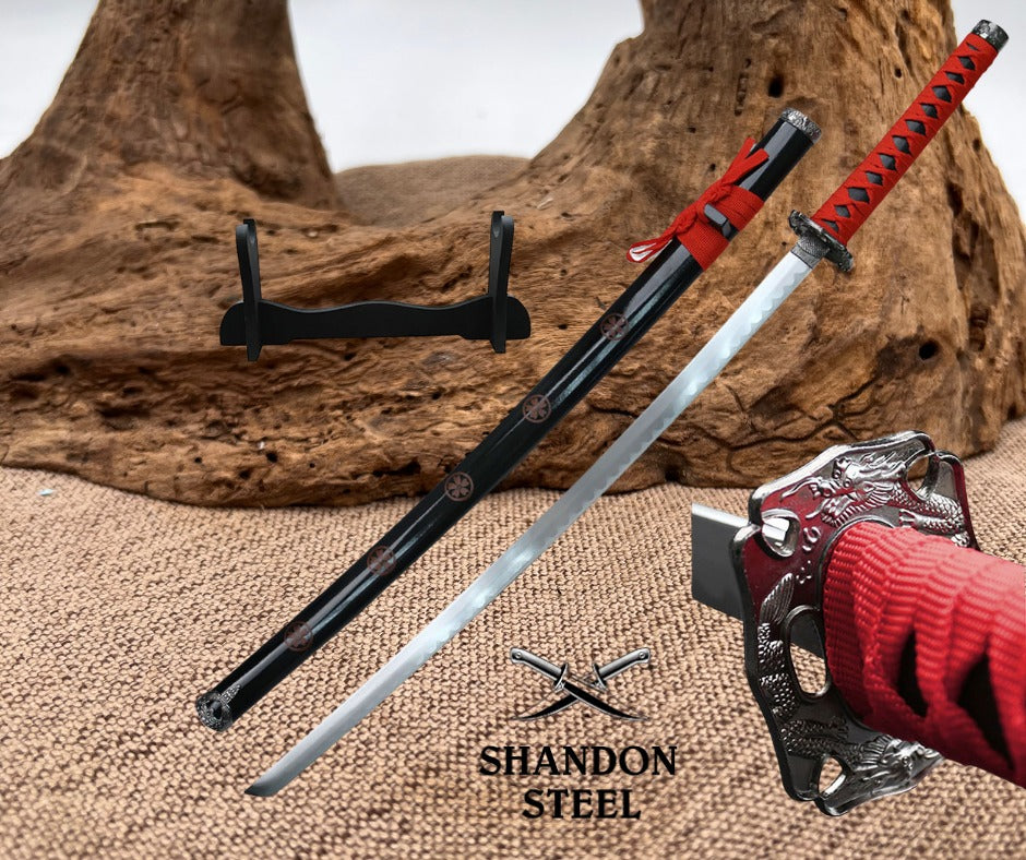 Two swords with red sheaths on a wooden background, featuring the Shandon Steel logo.