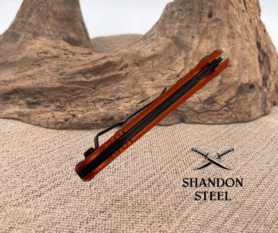 Microtech LUDT GEN III T/E BLACK PART SERRATE ORANGE 1136-2OR