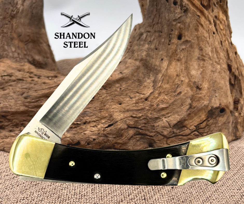 Buck 110 FOLDING  HUNTER,THIN,EBONY,BRASS HDL,MAGNACUT 0110BRS19