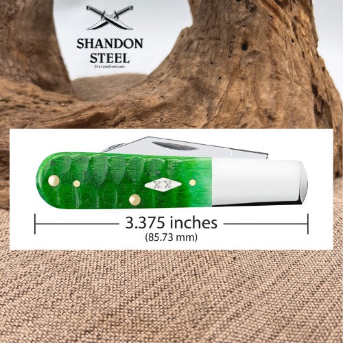 A green and white folding pocket knife shown on a white measurement panel with printed text indicating a length of 3.375 inches (85.