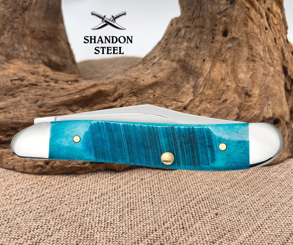 Case XX™ Knives Sawcut Jig Caribbean Blue Bone Peanut 25596