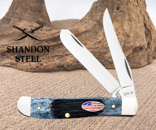 Foldable knife with blue handle and American flag design, branded 'Shandon Steel' and 'Case XX'.