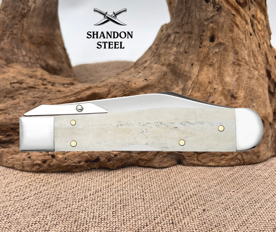 Case XX Smooth Natural Bone Cheetah@ Cub (611 1/2_ SS) 14026