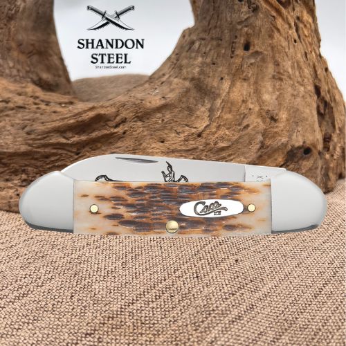Case XX™ Jigged Amber Bone Canoe Carbon Steel Pocket Knife 00263