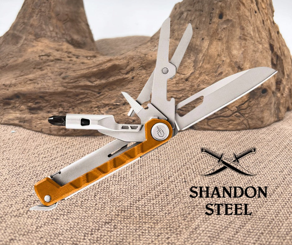 Multitool with orange and silver design on a textured surface with 'Shandon Steel' branding.