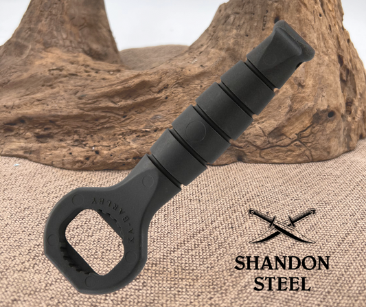Black bottle opener with textured grip on a beige surface, branded 'Shandon Steel'.