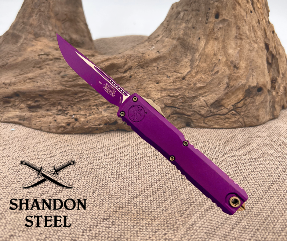 Purple folding knife with 'Shandon Steel' branding on a textured surface.