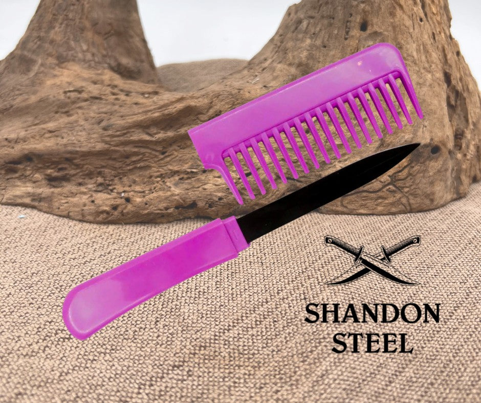 Purple comb with black blade on a textured surface, Shandon Steel logo visible