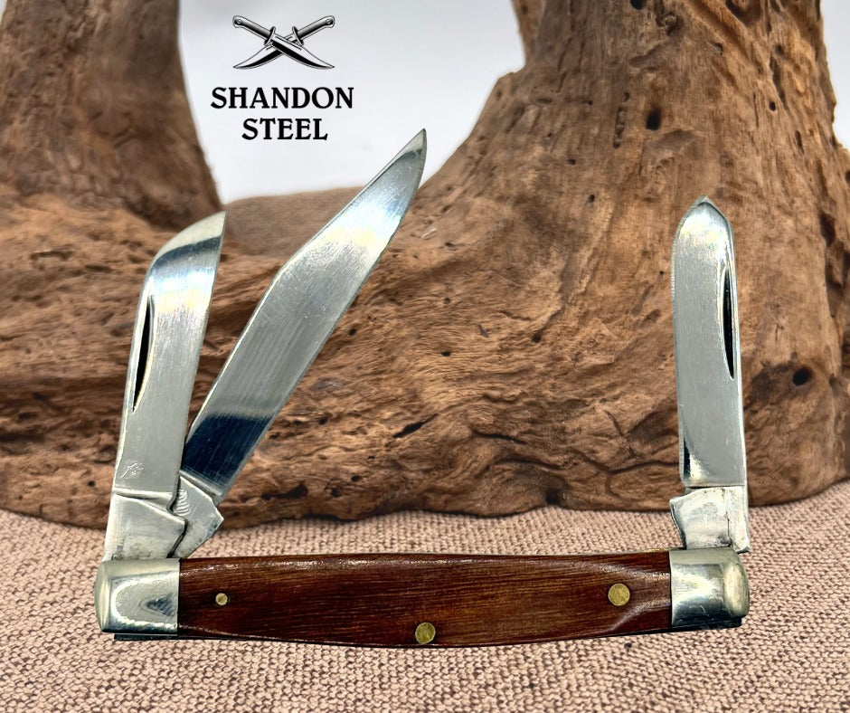 QUEEN USA Q81 THE RAWHIDE SERIES 3 BLADE STOCKMAN FOLDING POCKET KNIFE (148)