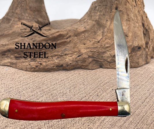 QUEEN STEEL SMOOTH RED COMPOSITION SLIMLINE TRAPPER SINGLE BLADE KNIFE (15)