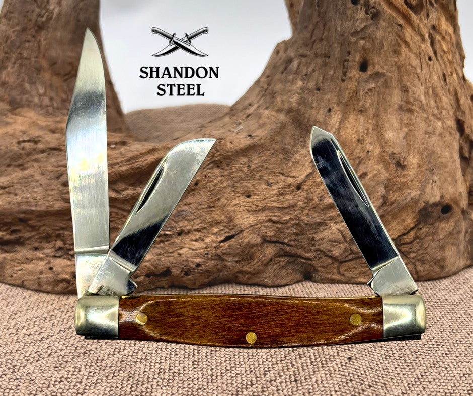 QUEEN USA Q81 THE RAWHIDE SERIES 3 BLADE STOCKMAN FOLDING POCKET KNIFE (147)