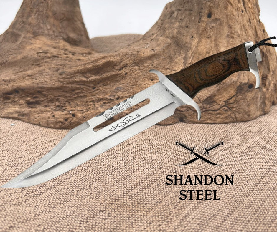 Knife with wooden handle on a textured surface, Shandon Steel logo visible