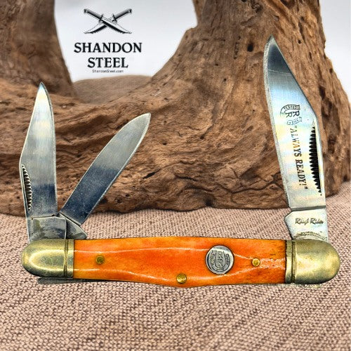 ROUGH RIDER KNIVES ORANGE SMOOTH BONE CENTER SWELL WHITTLER POCKET KNIFE (150)