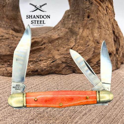 ROUGH RIDER KNIVES ORANGE SMOOTH BONE CENTER SWELL WHITTLER POCKET KNIFE (150)