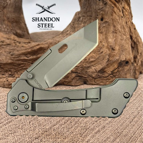 Schrade Frame Lock Titanium Coated Tanto Blade w/ Ambidextrious Thumbstud SCH301