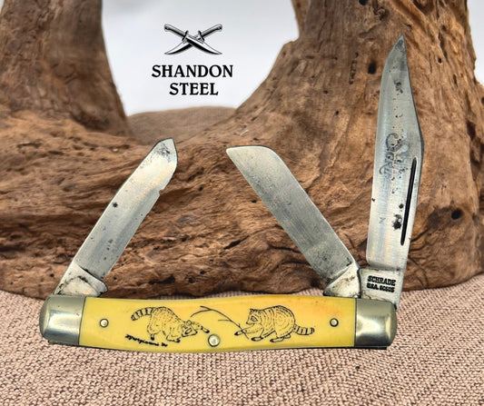 SCHRADE SCRIMSHAW 1980 CARBON STEEL RACCOONS STOCKMAN KNIFE U.S.A. SC505 (127)