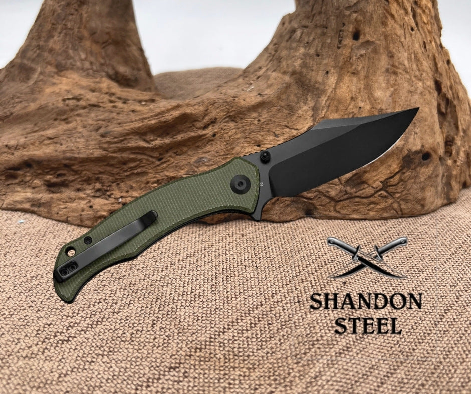 SENCUT Tauron Flipper & Thumb Stud Knife Olive Canvas Micarta Handle (3.48" Black D2 Blade) S25060-3